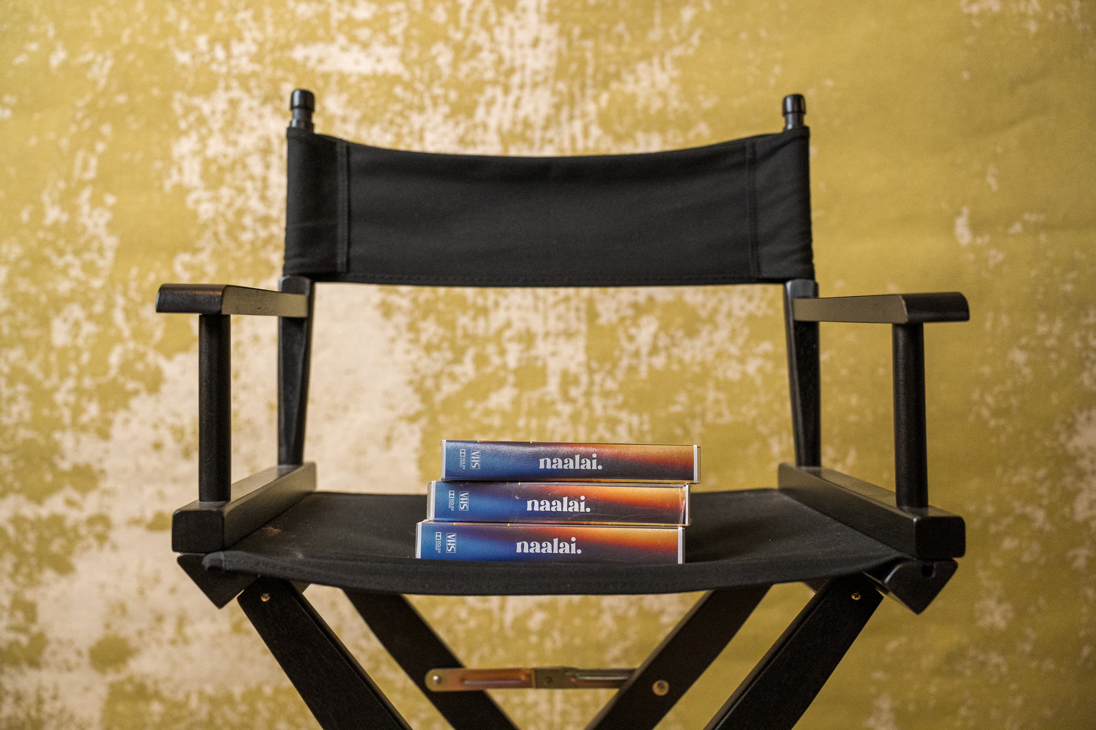 Director chair with Naalai VHS tapes